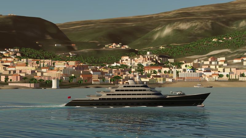 A superyacht passing Positano on the Amalfi Coast, in Yacht Skipper